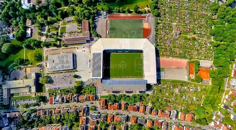 Aerial view, football stadium SchücoArena of DSC Arminia Bielefeld, also Almstadion or Bielefelder Alm, solar roof, fisheye image, fisheye image, 360 degree image, tiny world, little planet, fisheye image, centre, Bielefeld, East Westphalia, North Rhine-Westphalia, Germany, football stadium, SchücoArena, DSC Arminia Bielefeld, Almstadion, Bielefelder Alm, fisheye, stadium, panoramic view, architectural, sport, architecture, solar energy, football, perspective, panoramic image, technology, renewable energy, city view, modern, energy efficiency, building, exterior shot, drone shot, sporting event, course