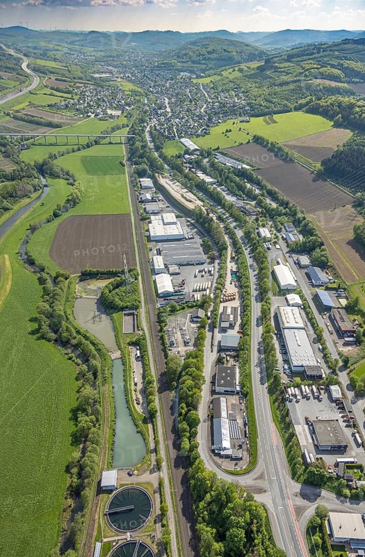 Aerial view, industrial area Im Öhler, distant view with view to Velmede and Ruhr valley bridge Velmede, logistics centre Spediiton Häger, hilly landscape, meadows and fields, Velmede, Bestwig, Sauerland, North Rhine-Westphalia, Germany, industrial area, Im Öhler, distance, Ruhr valley bridge, logistics centre, forwarding agency Häger, meadows, fields, industrial area, landscape, nature, bridge, logistics, transport, infrastructure, rural, perspective, panoramic view, traffic, economy, architecture, building, structure, panorama, environment