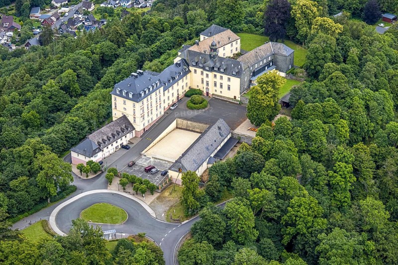 Aerial view, Wittgenstein Castle in the forest, Wittgenstein art, Bad Laasphe, Wittgensteiner Land, North Rhine-Westphalia, Germany, view, architecture, view, exterior shot, trees, monument, drone shot, Europe, building, history, culture, landscape, Middle Ages, nature, panorama, castle, Schloss Wittgenstein, sight, summer, daylight, tourism, landmark, forest, wooded, historical, rural, majestic, medieval, overview