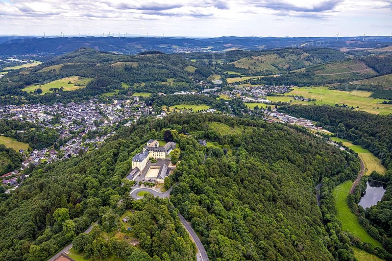 Aerial view, Wittgenstein Castle, view over Bad Laasphe with hilly landscape and distant view, Wittgenstein art, Bad Laasphe, Wittgensteiner Land, North Rhine-Westphalia, Germany, architecture, mountains, Europe, distant view, green areas, sky, hill, hilly landscape, culture, landscape, nature, panorama, sight, summer, city view, daylight, tourism, environment, urban, landmark, clouds, historical buildings, medieval