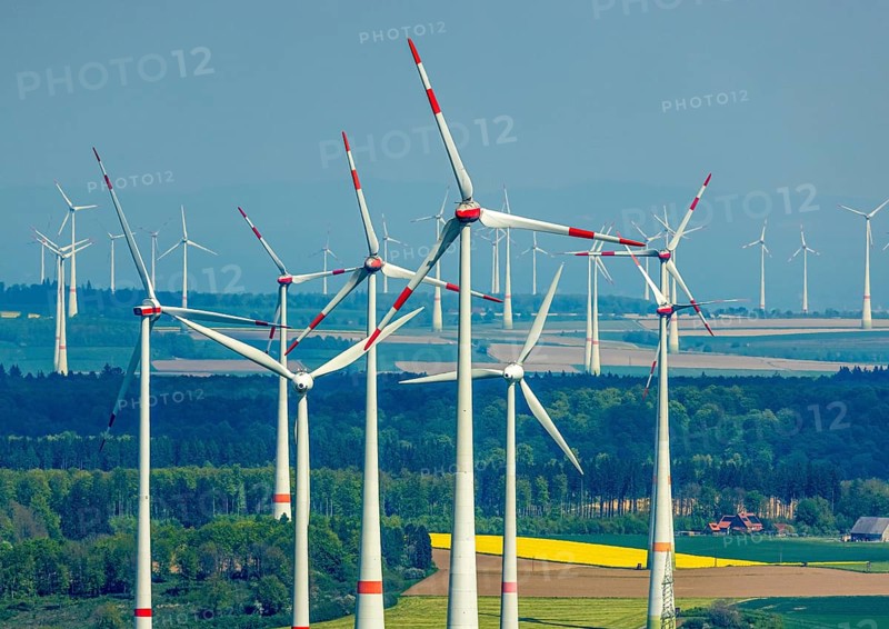 Aerial view, wind park and wind farm wind energy plant, wind turbines and rape fields near Radlinghausen, Messinghausen, Brilon, East Westphalia, Sauerland, North Rhine-Westphalia, Germany, wind park, wind farm, wind energy plant, wind turbines, rape fields, Radlinghausen, renewable energy, green energy, landscape, agriculture, fields, rural area, sky, wind power, energy production, environmental protection, infrastructure, technology, nature, sustainable energy, ecology, agricultural landscape, view, drone shot, spring weather, clarity, panorama, extensive