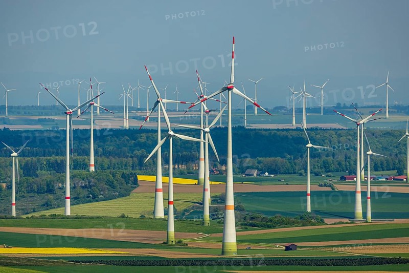 Aerial view, wind park and wind farm wind energy plant, wind turbines and rape fields near Radlinghausen, Messinghausen, Brilon, East Westphalia, Sauerland, North Rhine-Westphalia, Germany, wind park, wind farm, wind energy plant, wind turbines, rape fields, Radlinghausen, renewable energy, green energy, landscape, rural, fields, nature, climate, environmental protection, agriculture, energy production, sustainable energy, sky, horizon, infrastructure, technology, view, electricity, spring landscape, clean energy, environment, agricultural landscape, village, settlement, pollen, blossom, vastness, modernity, vegetation, corn, agroindustrial