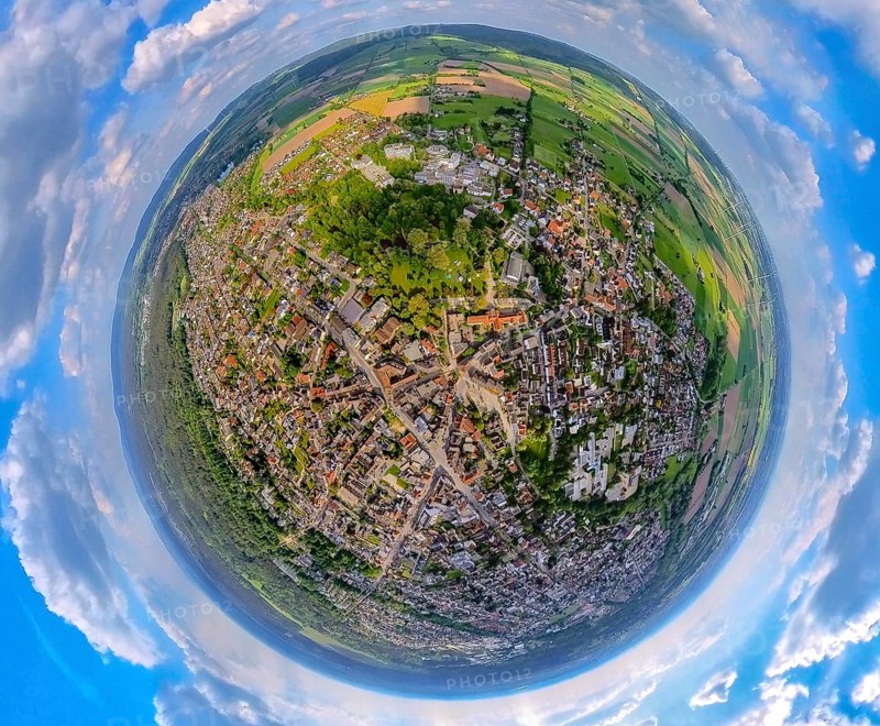 Aerial view, view of Bad Lippspringe with congress centre, Arminiuspark with castle ruins and river Lippequelle and Arminius Quelle Pavillon, Father's Day celebration in Arminiuspark at the congress centre with visitors, earth globe, fisheye image, 360 degree image, tiny world, little planet, Bad Lippspringe, East Westphalia, North Rhine-Westphalia, Germany, view of the town, congress centre, Arminiuspark, castle ruins, river, Lippe spring, Arminius spring pavilion, Father's Day festival, visitors, Tiny World, Little Planet, fisheye image, park, festival, people, event, panorama, landscape, architecture, nature, urban, historical site, green spaces, holiday, pavilion, building, tourism, culture, leisure, recreation, bird's eye view, sky, day, summer, sight