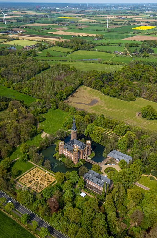 Aerial view, Museum Schloss Moyland, neo-Gothic moated castle and castle park surrounded by meadows and fields and forest, excursion destination on the Lower Rhine, Moyland, Bedburg-Hau, Lower Rhine, North Rhine-Westphalia, Germany, architecture, excursion destination, visitor, recreation, fields, leisure, geography, history, green spaces, sky, culture, landscape, museum, nature, outdoor, panorama, perspective, tranquillity, Moyland Castle, castle park, beauty, sight, daylight, tourism, forest, meadows, rural, neo-Gothic moated castle