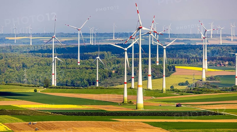 Aerial view, wind park and wind farm wind energy plant, wind turbines and rape fields near Radlinghausen, Messinghausen, Brilon, East Westphalia, Sauerland, North Rhine-Westphalia, Germany, wind park, wind farm, wind energy plant, wind turbines, rape fields, Radlinghausen, renewable energy, landscape, agriculture, nature, fields, environment, sustainable energy, technology, energy production, yellow, green, sky, rural, bird's eye view, power generation, modern technology, sustainable development, electricity, energy production, clean energy, environmental sustainability