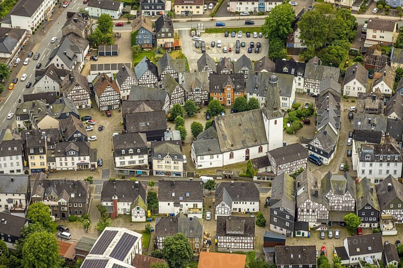 Aerial view, protestant town church and church square in the town centre with historic half-timbered houses, Bad Laasphe, Wittgensteiner Land, North Rhine-Westphalia, Germany, old town, architecture, village, half-timbered, building, history, green trees, home, church, church square, culture, landscape, aerial view, nature, town centre, religion, sight, summer, town, cityscape, tourism, tradition, wooded, protestant town church, peaceful, historic half-timbered houses, rural, picturesque
