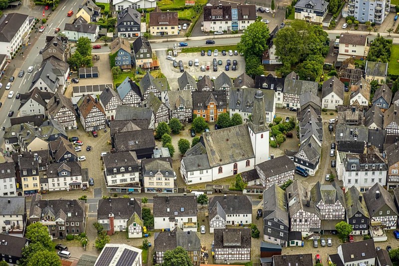 Aerial view, protestant town church and church square in the town centre with historic half-timbered houses, Bad Laasphe, Wittgensteiner Land, North Rhine-Westphalia, Germany, old town, architecture, tree, village, village centre, spring, building, history, green trees, autumn, sky, idyll, church, church square, church tower, culture, landscape, nature, town centre, panorama, religion, sight, settlement, summer, town, structure, daylight, tourism, tradition, European, protestant town church, historic half-timbered houses, rural, picturesque