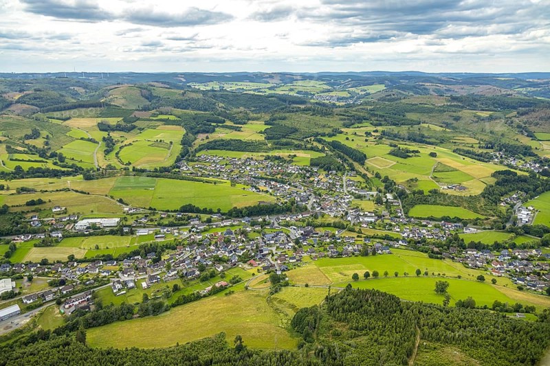 Aerial view, local view residential area Banfe, wooded hilly landscape, distant view and blue sky with clouds, Banfe, Bad Laasphe, Wittgensteiner Land, North Rhine-Westphalia, Germany, architecture, outdoor shot, forestation, village, distant view, community, green areas, houses, hill, idyll, landscape, aerial view, nature, local view, panorama, region, tranquility, settlement, summer, daylight, environment, residential area, clouds, forests, blue sky, rural, vegetation