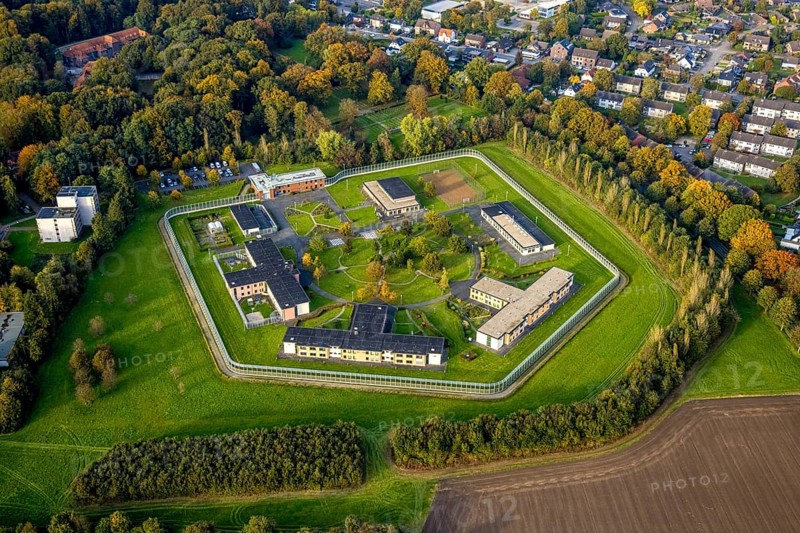 Aerial view, Forensic Psychiatry - LVR Clinic, Houses F1 to F7, Bedburg-Hau, Lower Rhine, North Rhine-Westphalia, Germany, architecture, exterior view, trees, service, roofs, facility, F1, F7, Forensic Psychiatry, building, terrain, healthcare facility, green, sky, houses, infrastructure, institution, complex, LVR Clinic, landscape, organisation, day, environment, bird's eye view, geographical, medical, professional, psychiatric, regional, structured, public service