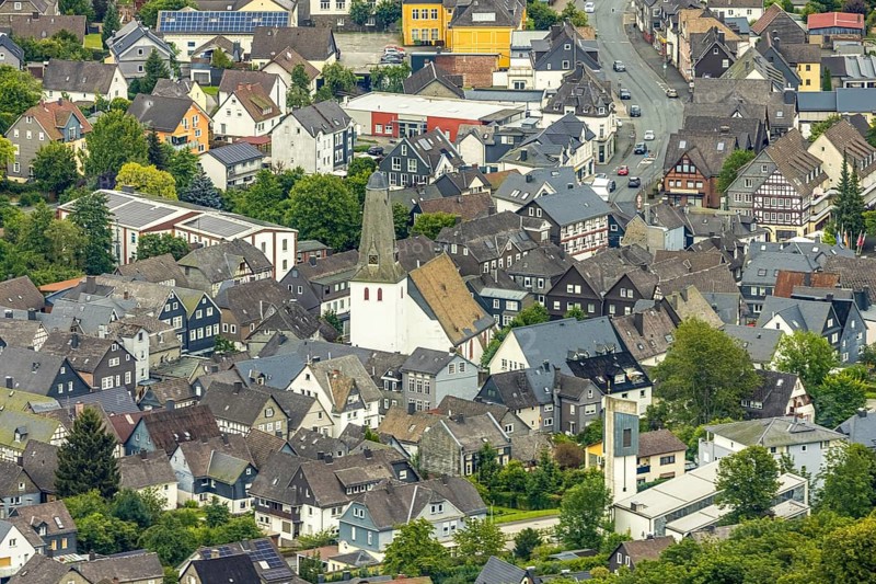 Aerial view, evang. Town church and church square in the town centre with historic half-timbered houses, Bad Laasphe, Wittgensteiner Land, North Rhine-Westphalia, Germany, Old Town, Architecture, Exterior view, Trees, Monument, Village, Europe, Half-timbered, Building, Community, Green trees, Idyllic, Church, church square, church tower, culture, landscape, town centre, region, religion, sight, settlement, summer, town, daytime, tourism, tradition, forest, protestant town church, peaceful, historic, historic half-timbered houses, rural, picturesque, regional, vegetation