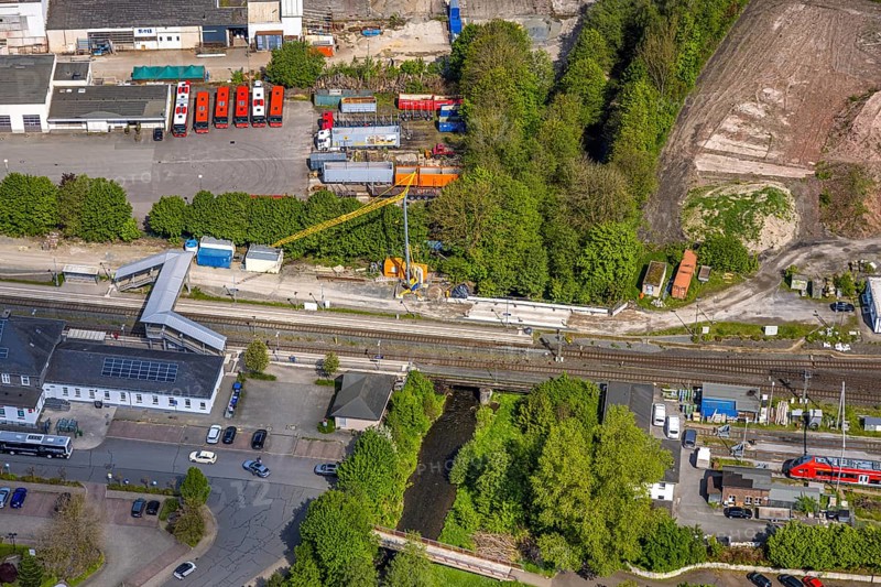 Aerial view, Bestwig railway station, Deutsche Bahn AG, construction site with construction crane, covered pedestrian crossing, Bestwig, Sauerland, North Rhine-Westphalia, Germany, construction site, construction crane, pedestrian crossing, covered, railway, train, rails, traffic, infrastructure, construction, construction work, transport, building, aerial view, city, urban, development, modernisation, architecture, bridge, commuter, civil engineering, public transport, landscape, region