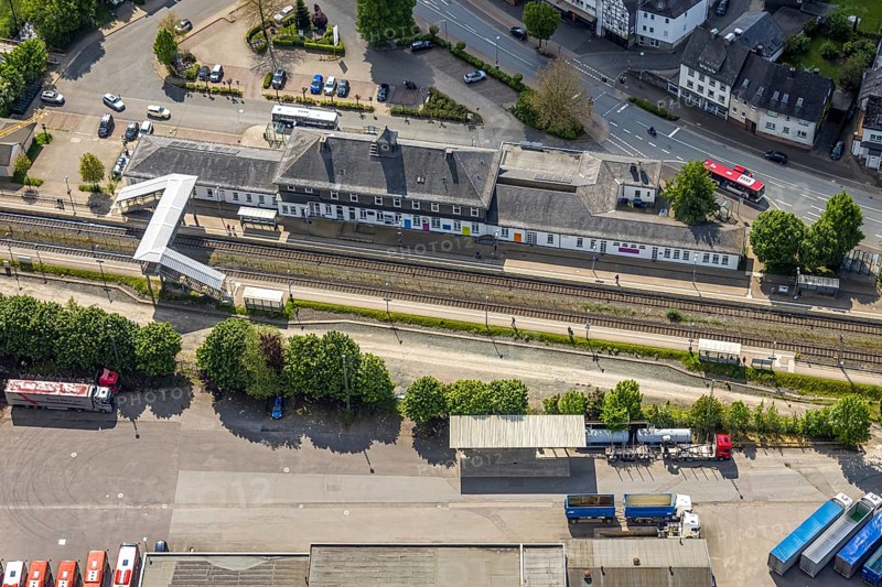 Aerial view, Bestwig railway station, Deutsche Bahn AG, construction site with construction crane, pedestrian crossing covered, Bestwig, Sauerland, North Rhine-Westphalia, Germany, construction site, construction crane, pedestrian crossing, covered, infrastructure, railway, rails, new construction, bridge, construction, architecture, traffic, commuter, urban, urban, transport, travel, German, technology, scaffolding, station, renovation, top view, structure, building, works, construction works, engineering, landscape, infrastructure projects
