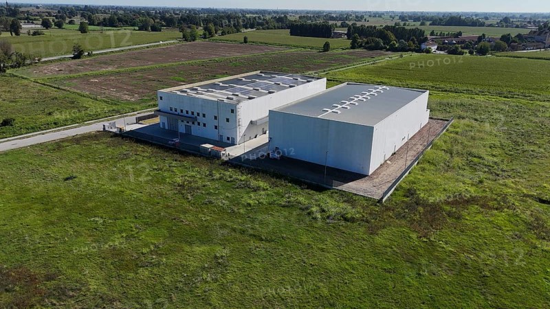 Cremona, Italy - August 22nd 2025 Modern Data Center Facility Under Construction in Rural Italian Landscape Symbolizing Future of Cloud Storage Technology and Digital Infrastructure Growth in Lombardy