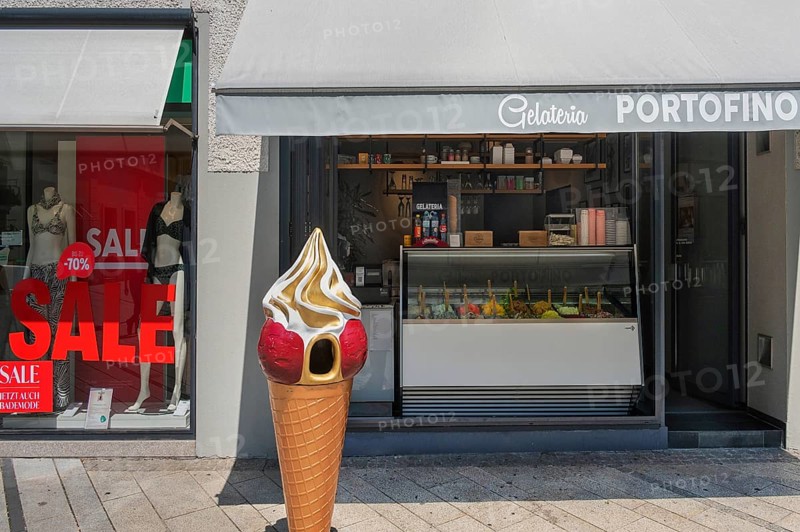 Shop window with swimwear 70% SALE, and gelateria, Dornbirn, Vorarlberg, Austria