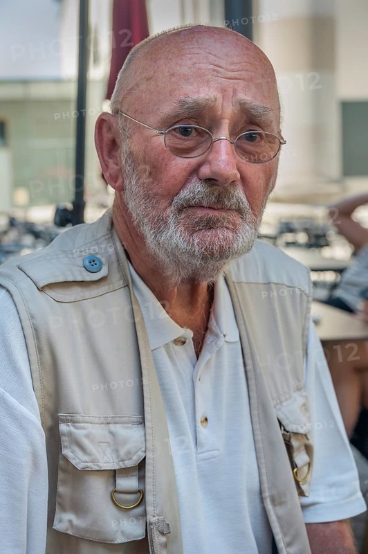 Elderly gentleman with beard, glasses and a somewhat sad look, Dornbirn, Vorarlberg, Austria
