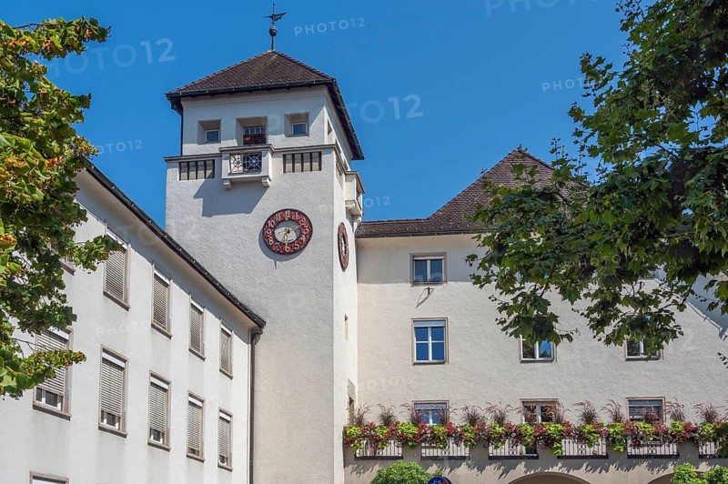 Light grey façade with tower, clock and floral decorations, Dornbirn, Vorarlberg, Austria
