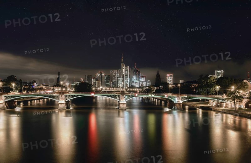 Frankfurt skyline, Main bridge and river at night under the stars, city centre, Frankfurt am Main, Hesse, Germany