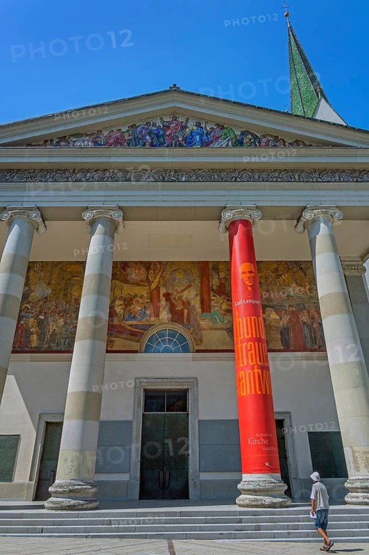 The Roman Catholic parish church of St Martin, entrance with a monumental Ionic temple façade, with six free columns and classical gable triangle and large fresco, Dornbirn, Vorarlberg, Austria