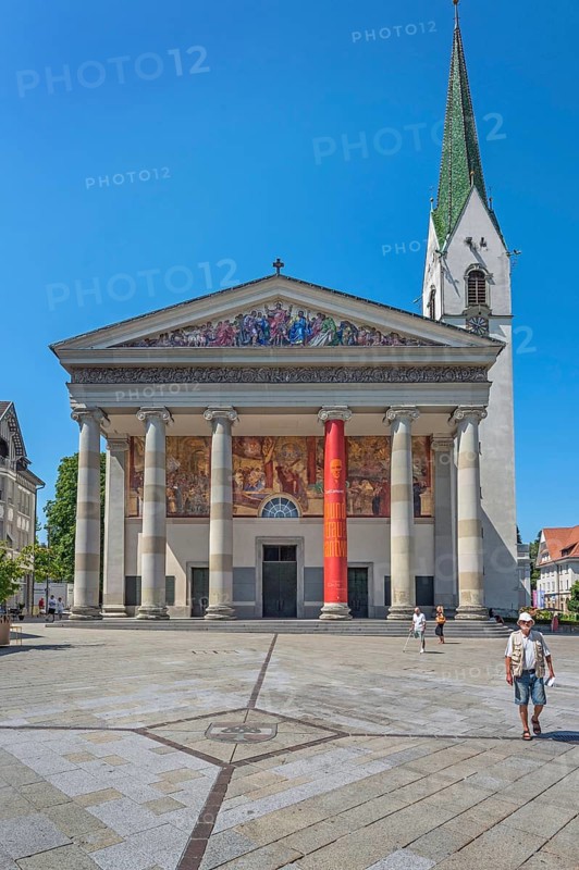 The Roman Catholic parish church of St Martin, entrance with a monumental Ionic temple façade, with six free columns and classical gable triangle and large fresco, Dornbirn, Vorarlberg, Austria