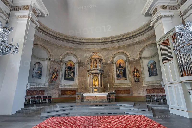 The Roman Catholic parish church of St Martin, interior with altar and wall frescoes, Dornbirn, Vorarlberg, Austria