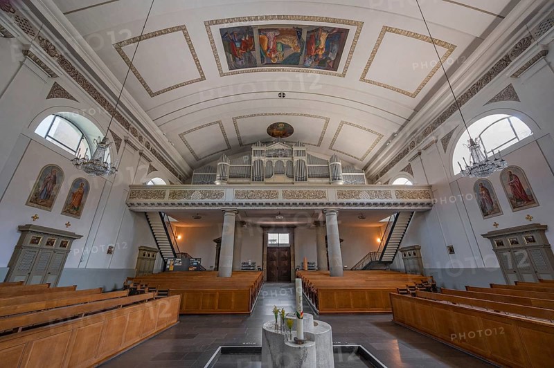 The Roman Catholic parish church of St Martin, interior with organ loft, Behmann organ, ceiling frescoes and baptismal font, Dornbirn, Vorarlberg