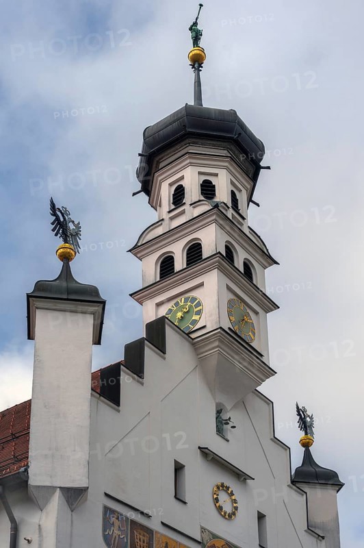 Town hall tower with clocks, metal eagles, Justitia and bronze trombone blower, Kempten, Allgäu, Bavaria, Germany