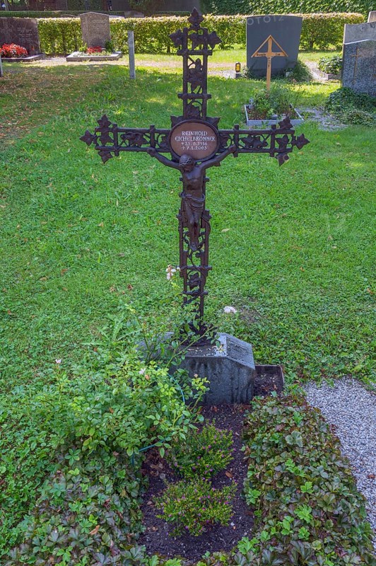 Gravesite with wrought-iron crucifix, Catholic cemetery, Kempten, Allgäu, Bavaria, Germany