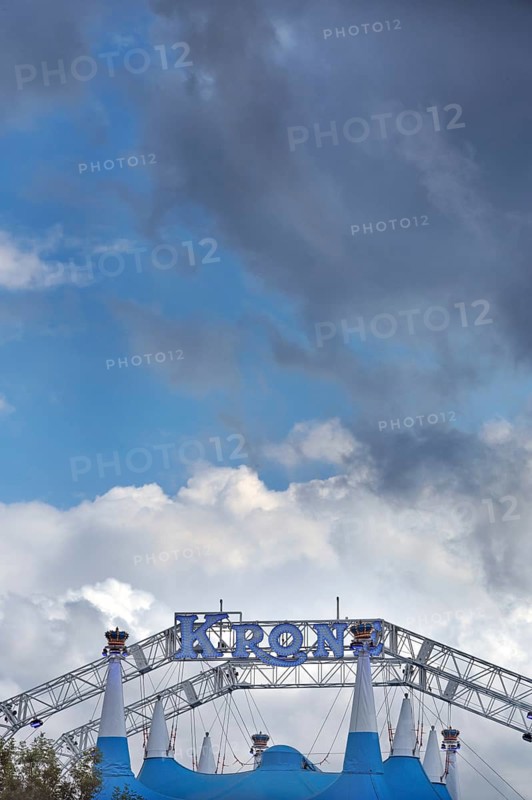 Circus tent, circus tent with luminous lettering in front of a blue sky with white and grey clouds, Circus-Krone, Kempten, Allgäu, Bavaria, Germany