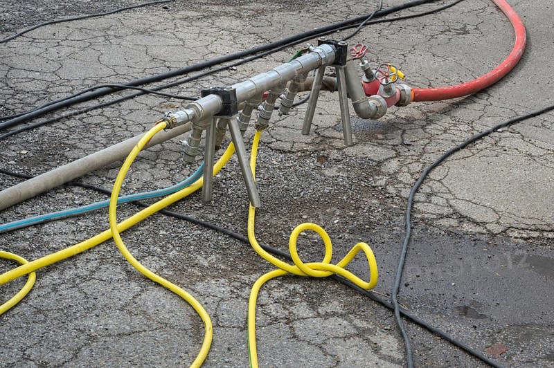 Distribution pipe with tangle of water hoses, Circus-Krone, Kempten, Allgäu, Bavaria, Germany