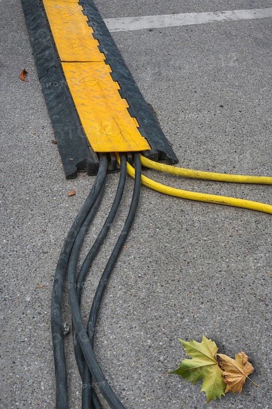 Power cable with cable bridge on asphalt, Circus-Krone, Kempten, Allgäu, Bavaria, Germany