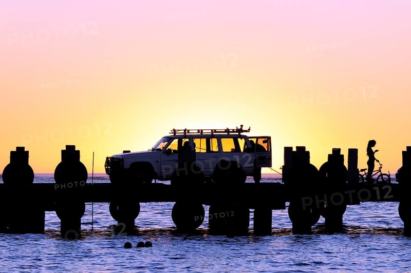 Sunset on the beach, car on a jetty near Lancelin, Perth, Western Australia, WA, Indian Ocean, Australia