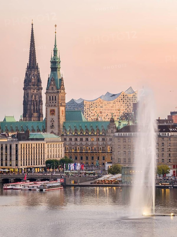 Aerial view of the Inner Alster with Alster fountain, Jungfernstieg, City Hall and Elbphilharmonie at sunset, Hamburg, Germany