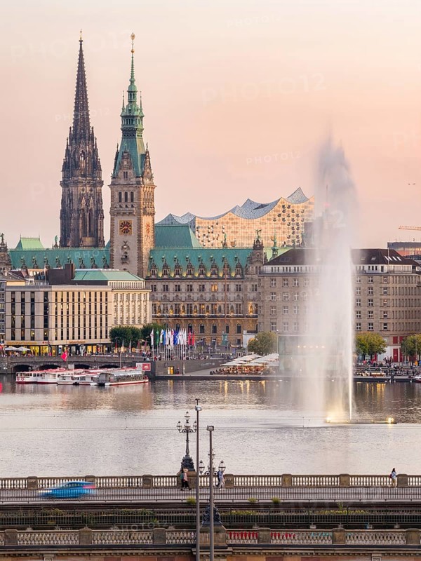Aerial view of the Inner Alster with Kennedy Bridge, Alster Fountain, Jungfernstieg, City Hall and Elbphilharmonie at sunset, Hamburg, Germany