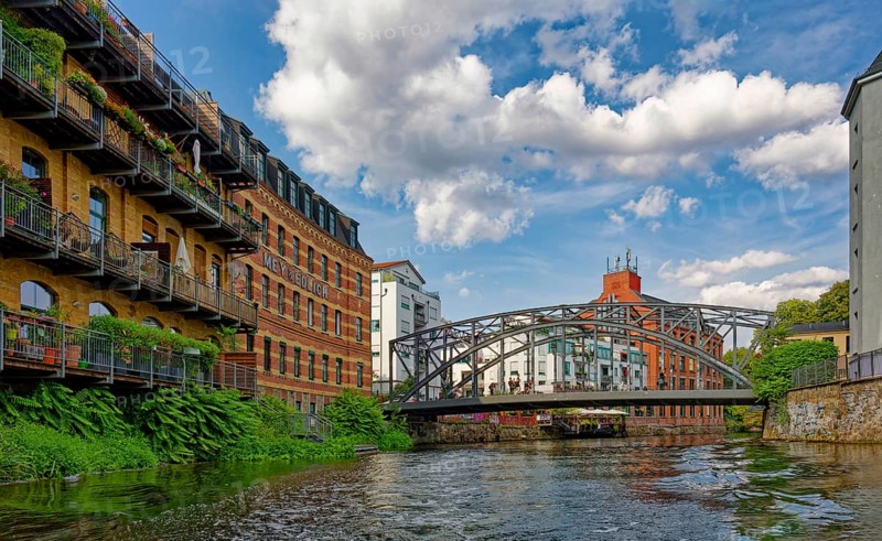 Könneritz Bridge, connection between the districts of Plagwitz and Schleußig and Mey and Edlich, industrial and residential building on the Weiße Elster river, factory building, Leipzig, Saxony, Germany