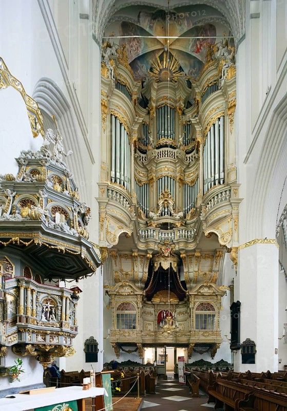 Left Renaissance pulpit from 1574 with baroque pulpit cover from 1723, Marienkirche, Protestant-Lutheran, North German brick Gothic, centre organ built in 1766, below prince's box, choir, basilica, three naves, built from 1290 to mid 15th century, harbour town, Hanseatic city, university town, Rostock, Mecklenburg-Western Pomerania, Germany