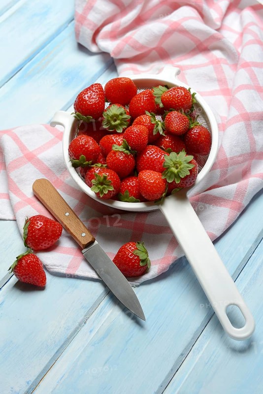 Strawberries in a colander, Fragaria x ananassa