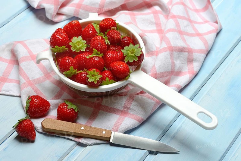 Strawberries in a colander, Fragaria x ananassa