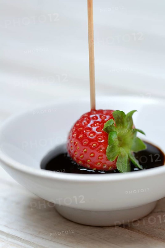 Strawberry and crema di balsamico in small bowls
