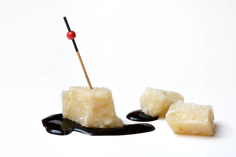 Parmesan cheese, pieces of cheese and crema di balsamico