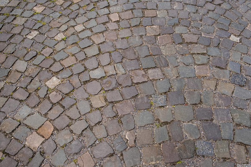 Cobblestones in a curved pattern and earthy colours, North Rhine-Westphalia, Germany