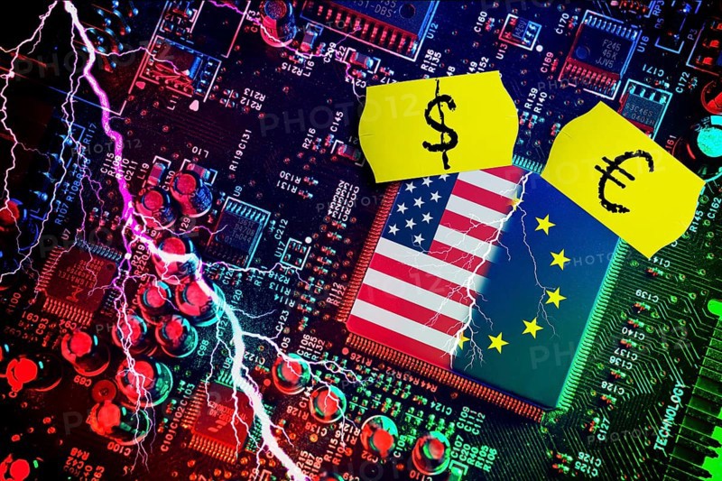 Computer chip with US and EU flags with price labels, symbolic photo Dispute over European digital laws and taxes for US digital companies, photomontage