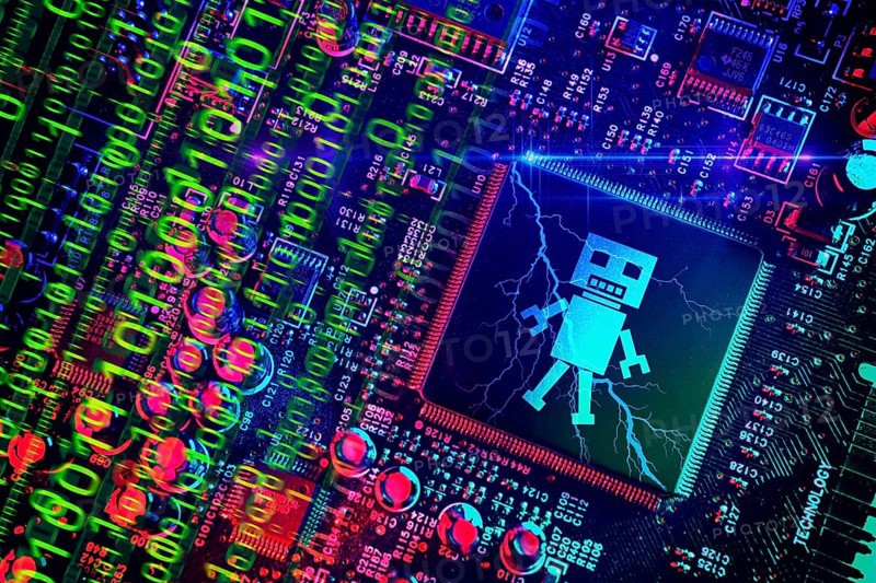 Computer chip with robot figure, symbolic photo of artificial intelligence, photomontage