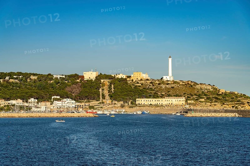 Town view with harbour and lighthouse in Santa Maria di Leuca, Apulia, Italy
