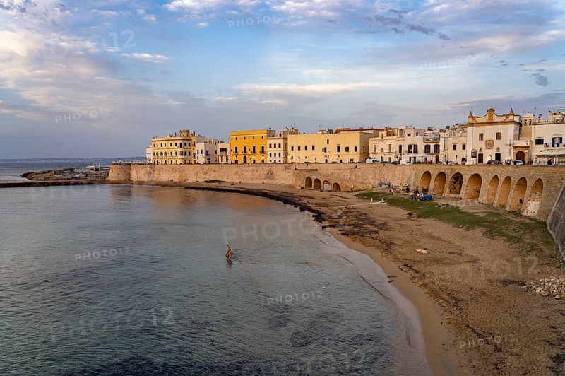 The Spiaggia della Purità city beach and the historic centre of Gallipoli, Apulia, Italy