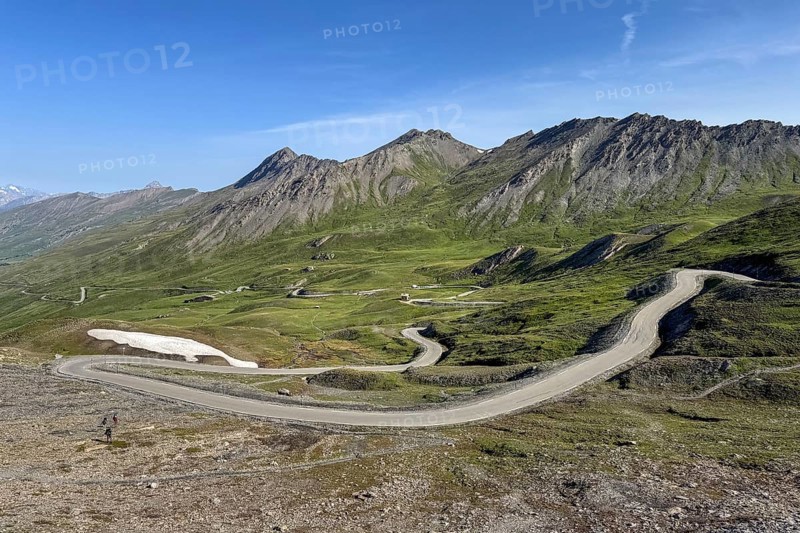 View of northern ramp northern ascent to descent from third highest asphalted pass Alpine pass highest border pass in the Alps 2744 m high Col Agnel above tree line, Colle dell' Agnello Colle dell' Agnello, Pontechianale, Piedmont, Italy