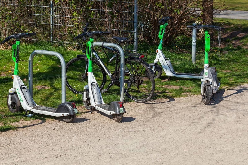E-scooters parked at a bicycle stand, Germany