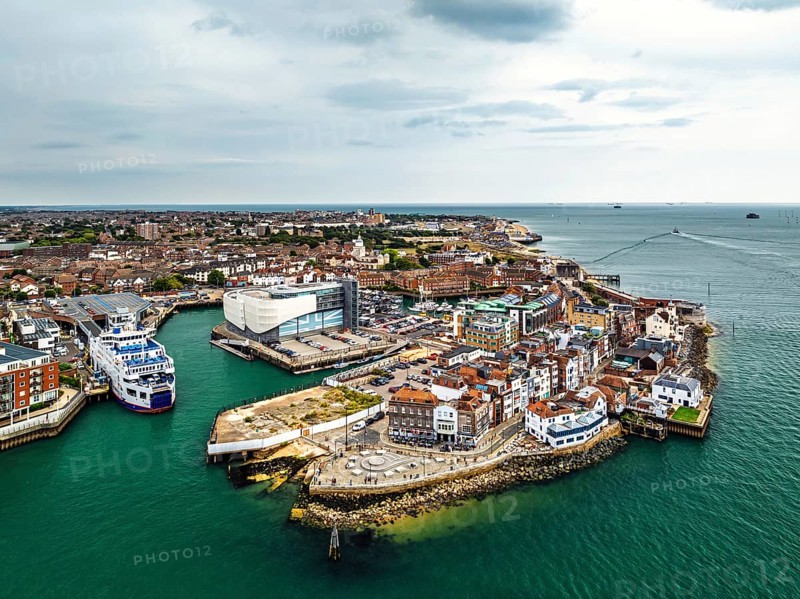 Portsmouth Harbour over Spinnaker Tower from a drone, Portsmouth, Gosport, England, United Kingdom