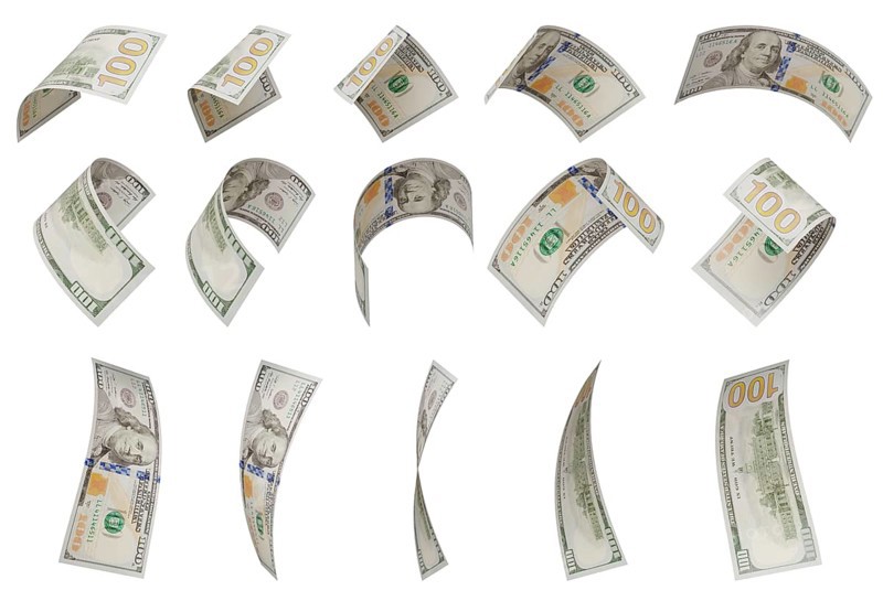Build your own set - randomly falling collection of U.S. 100 dollar bills isolated on a white background