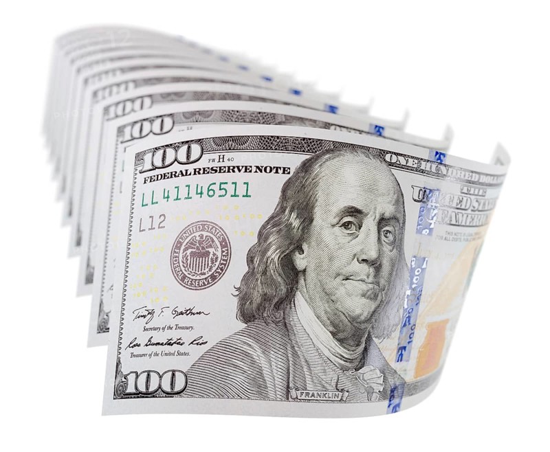 Abstract set of U.S. 100 dollar bills isolated on a white background