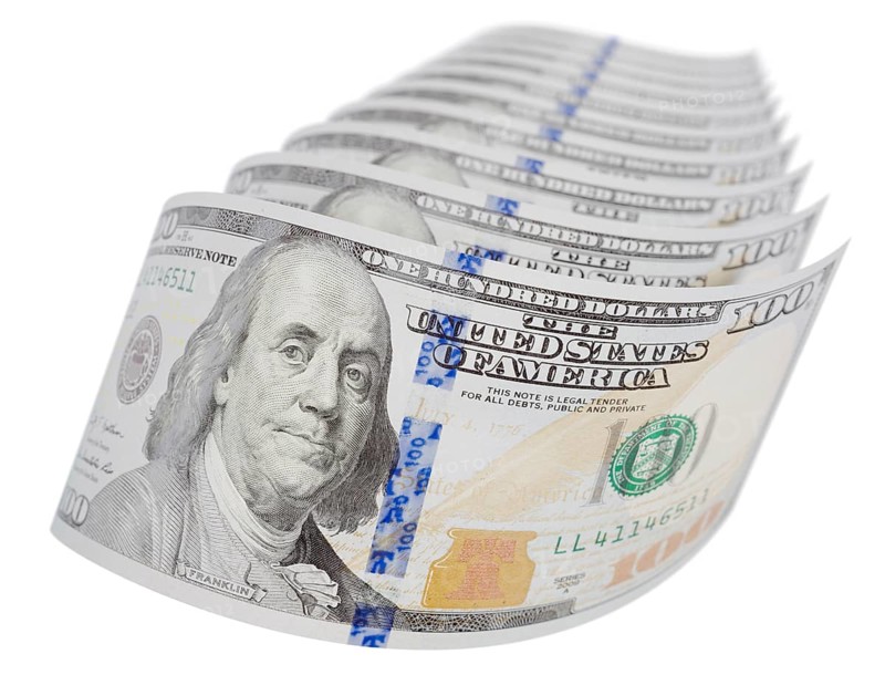 Abstract set of U.S. 100 dollar bills isolated on a white background